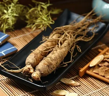 Whole ginseng roots laid out on a tray